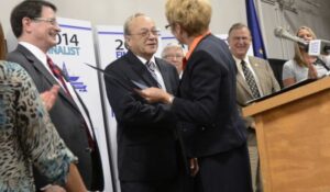 Lt. Governor Sue Ellspermann awards the Honorable Robert Vanlandingham with the Stellar Communities Designation from the State of Indiana.