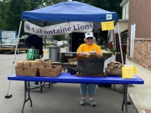 Street fair vendor selling tenderlions