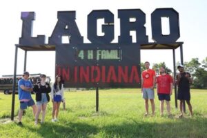 The fellows posing with the Lagro sign