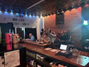 Customers enjoying drinks and games